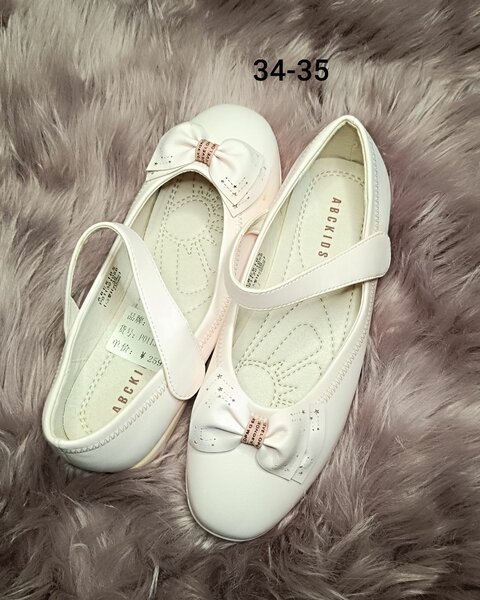 Ballerines blanches avec noeud