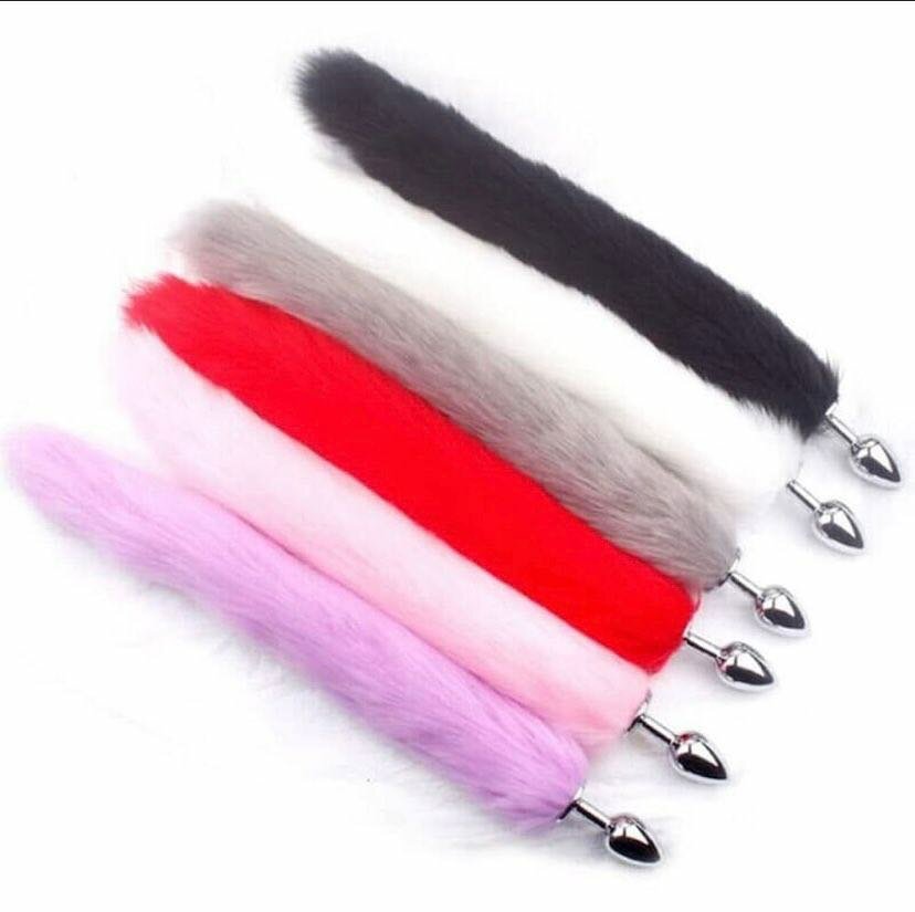 Plug avec queue en peluche colorée