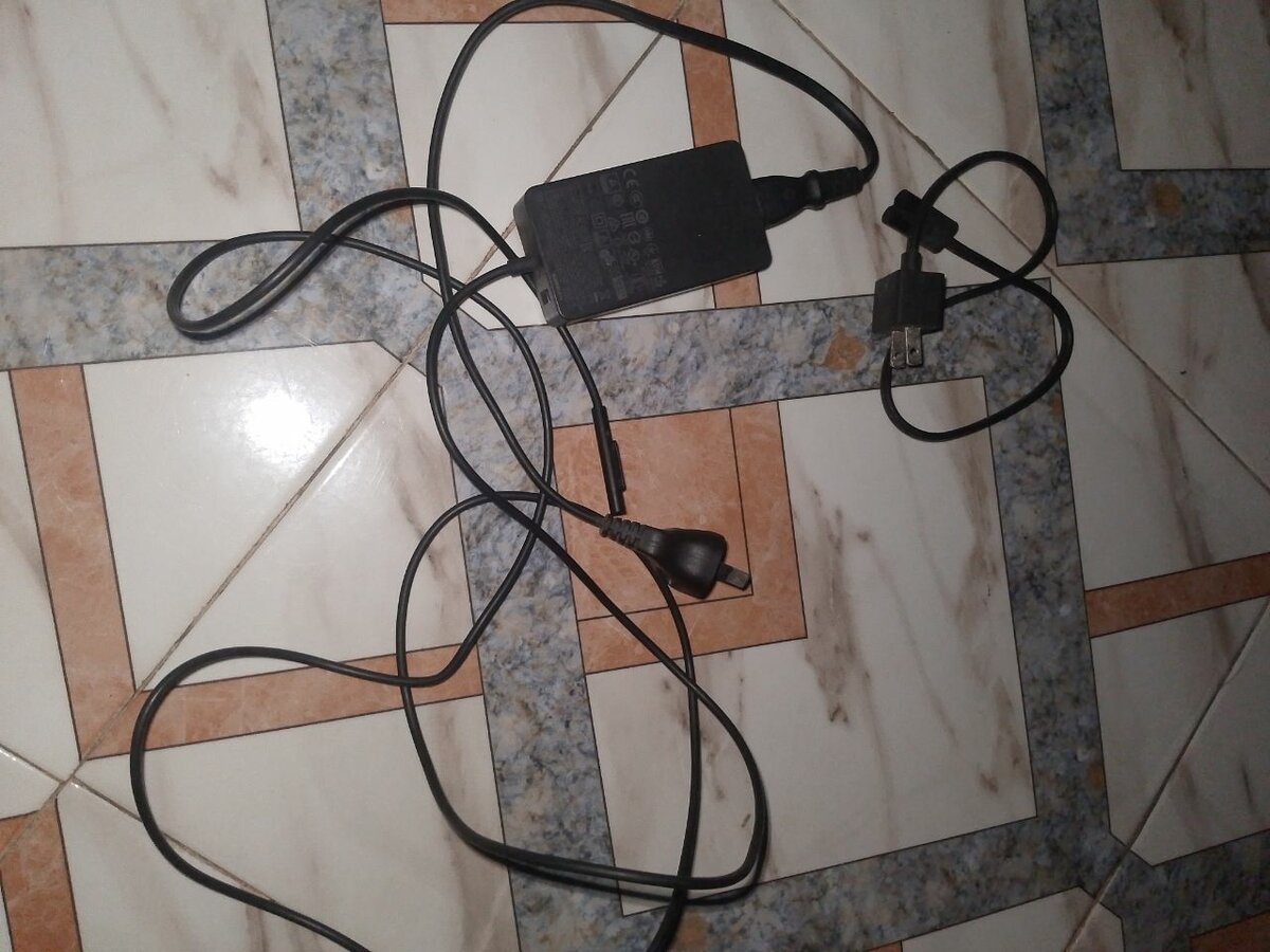 Power adapter for surface