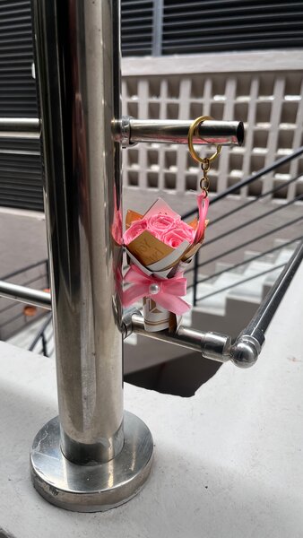 Porte-clés en bouquet rose