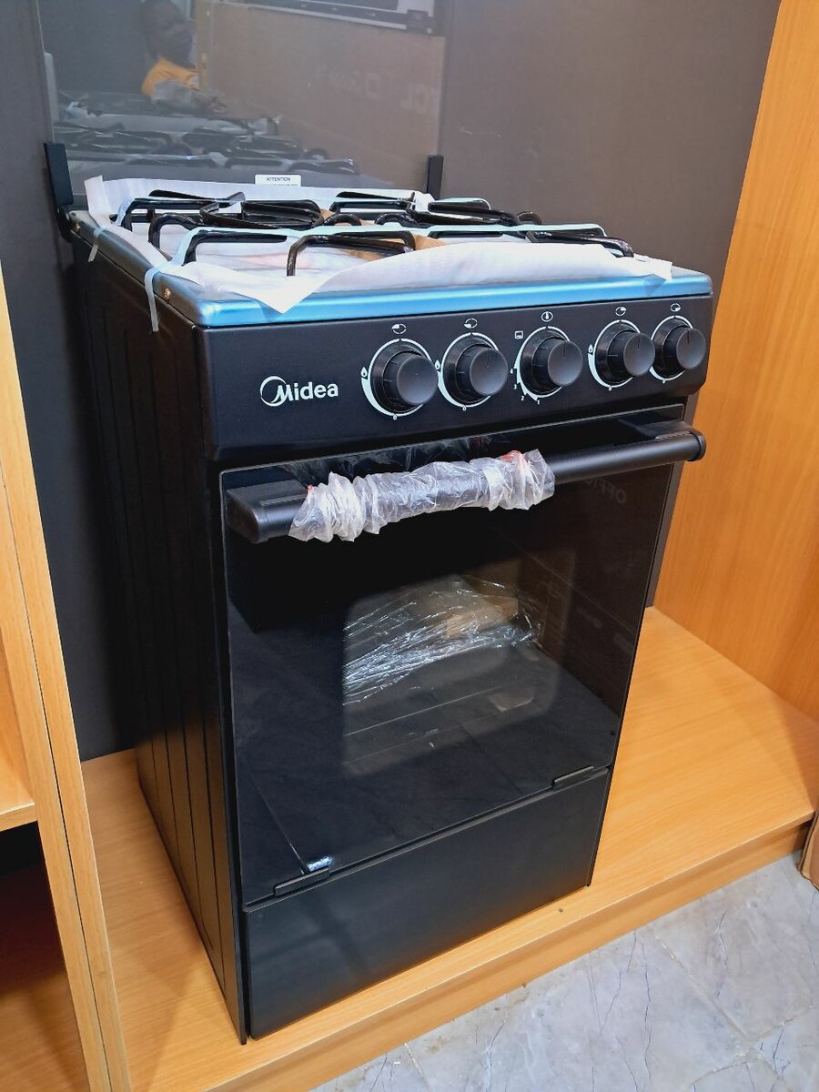 New Midea 4 burner gas stove with oven and Grill