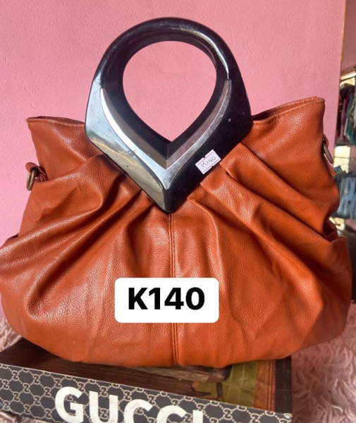 Women's bag with a beautiful handle