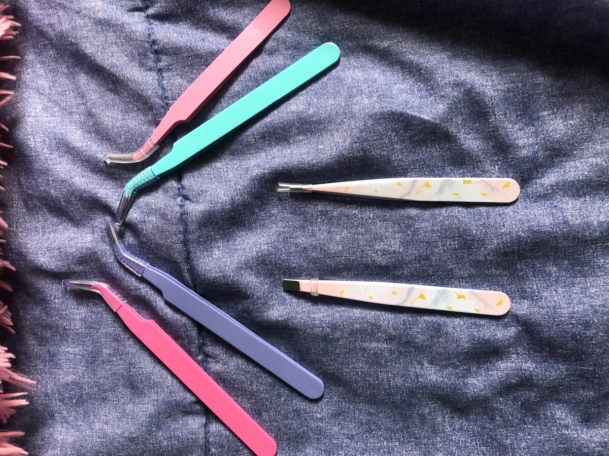 Lash and eyebrow tweezers each