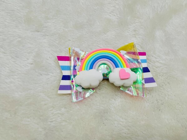 Rainbow style bow hair pins for kids.