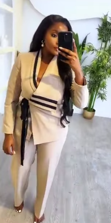 Women's white suit with black inserts