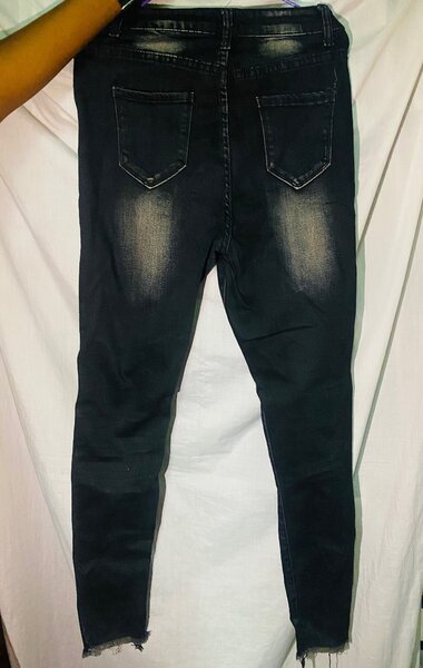 Jeans déchirés noirs tendance