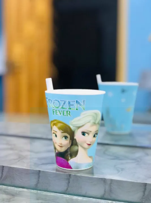 Beautiful built in plastic straw attached glass / juice glass with straw glass for kids