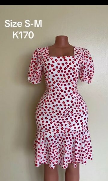 Light floral dress with hem in folds