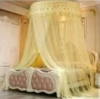 Beautiful translucent canopy for a bed yellow double 