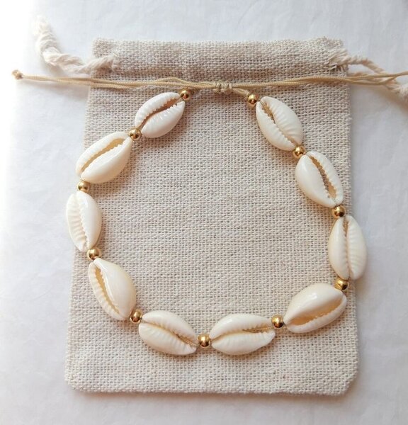 Chaîne au pied en Cauris