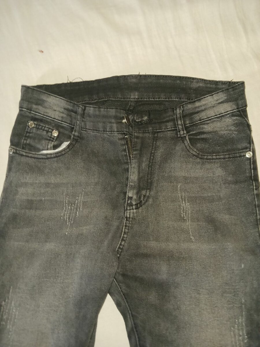 Jeans slim noir délavé
