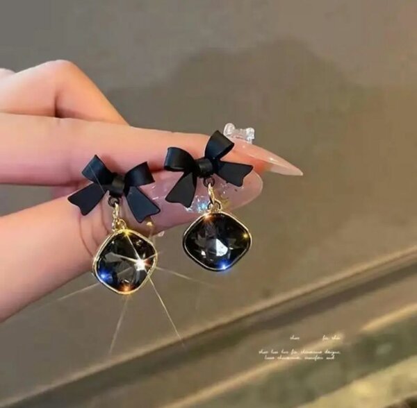 Boucles d'oreilles à nœud noir