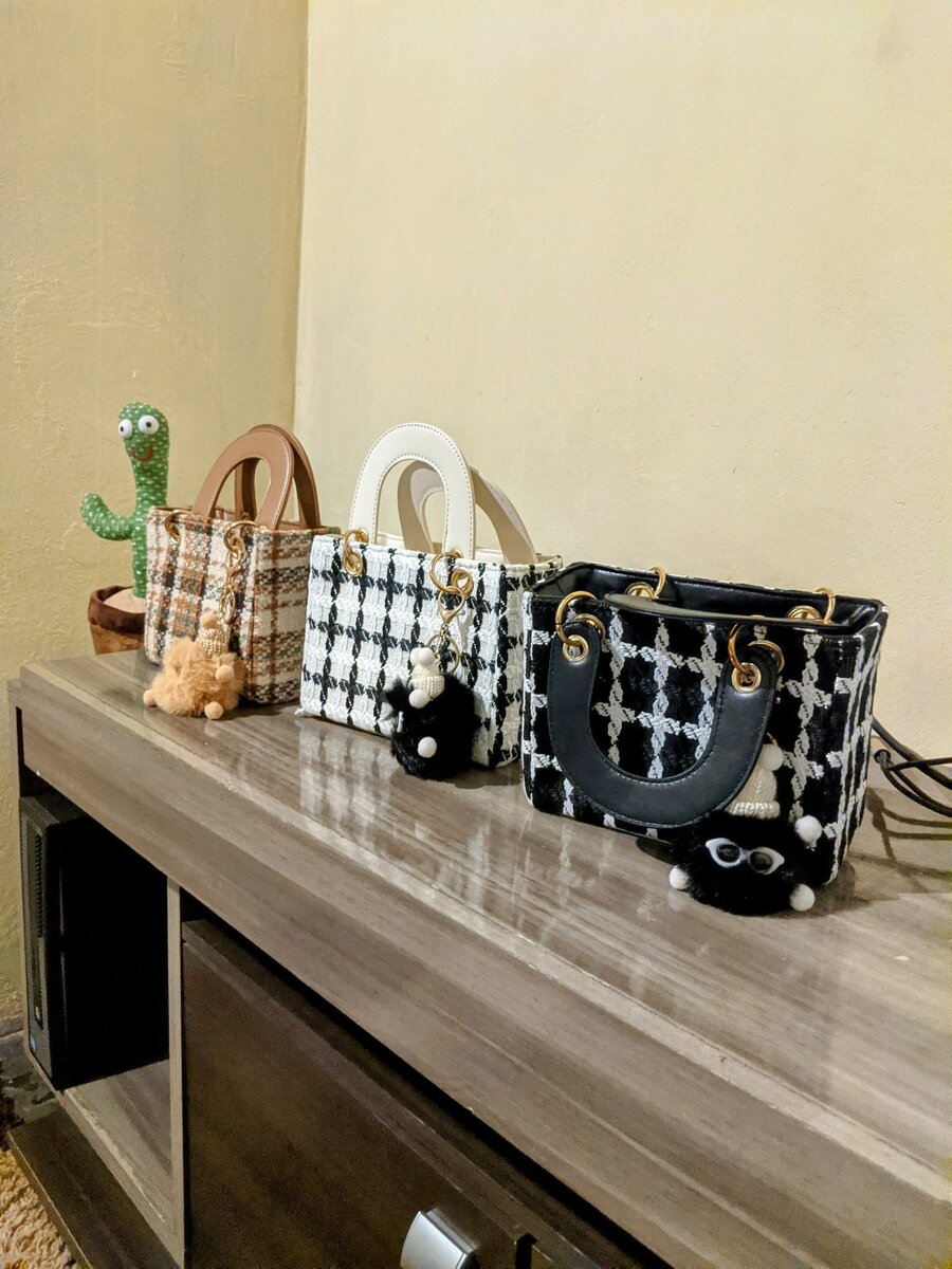 Designer Handbags  Look classy