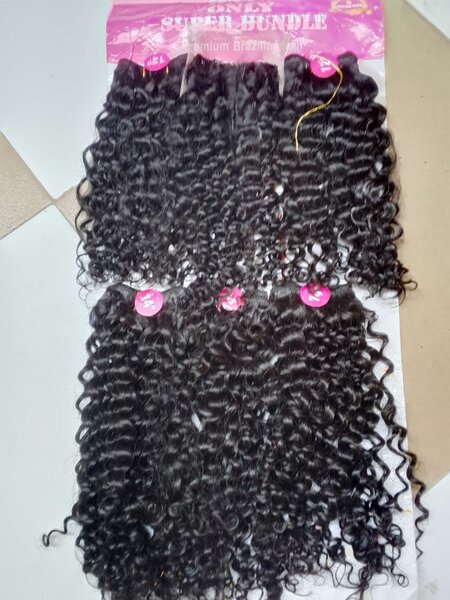 Extensions cheveux bouclés