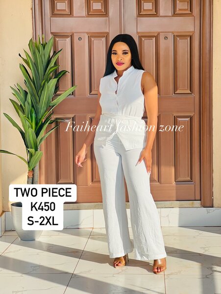 Women's set is white, sleeveless shirt and pants Sizes: S,M,L,XL,2XL