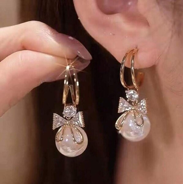 White pearl earrings