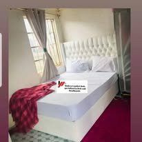 custom made bed with a high base