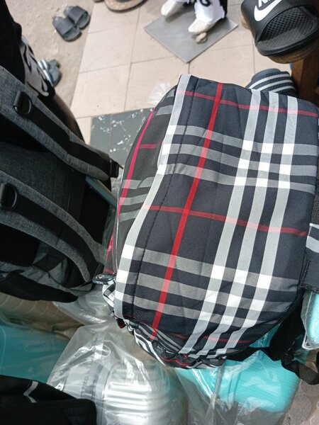 Sac à dos à carreaux tendance