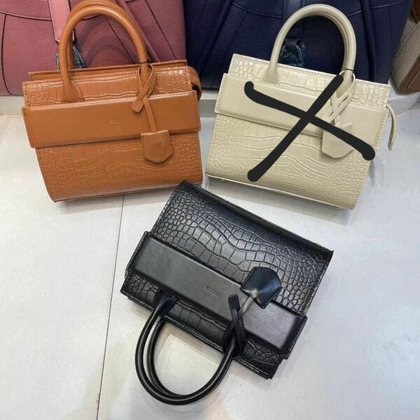 Sac à main élégant croco