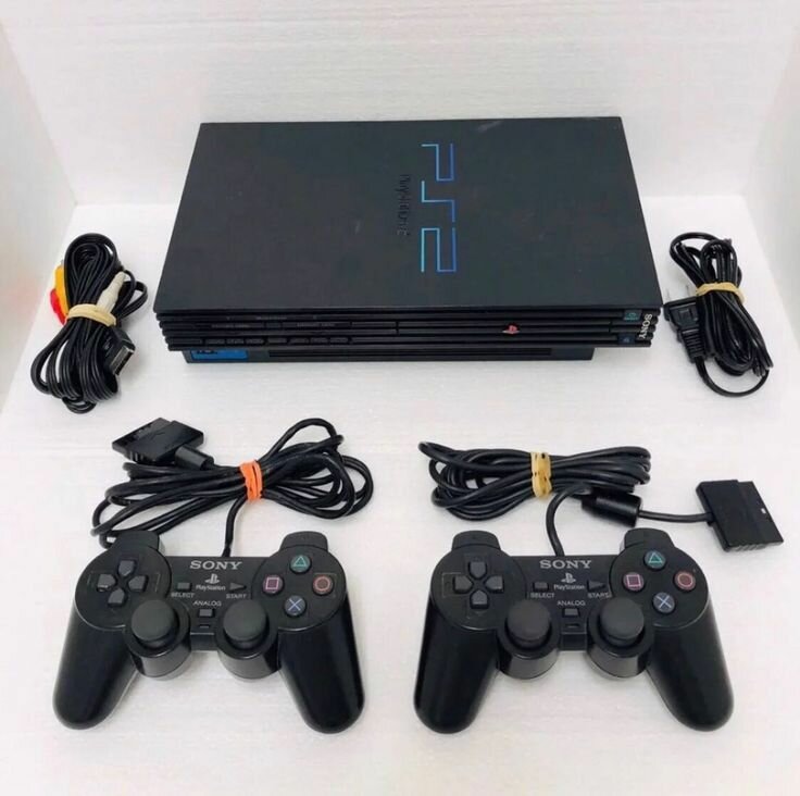 CONSOLE PS2 AVEC 2 MANETTES