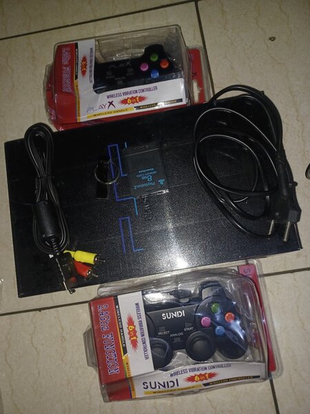 Ps2 craque +2 manettes sans fi