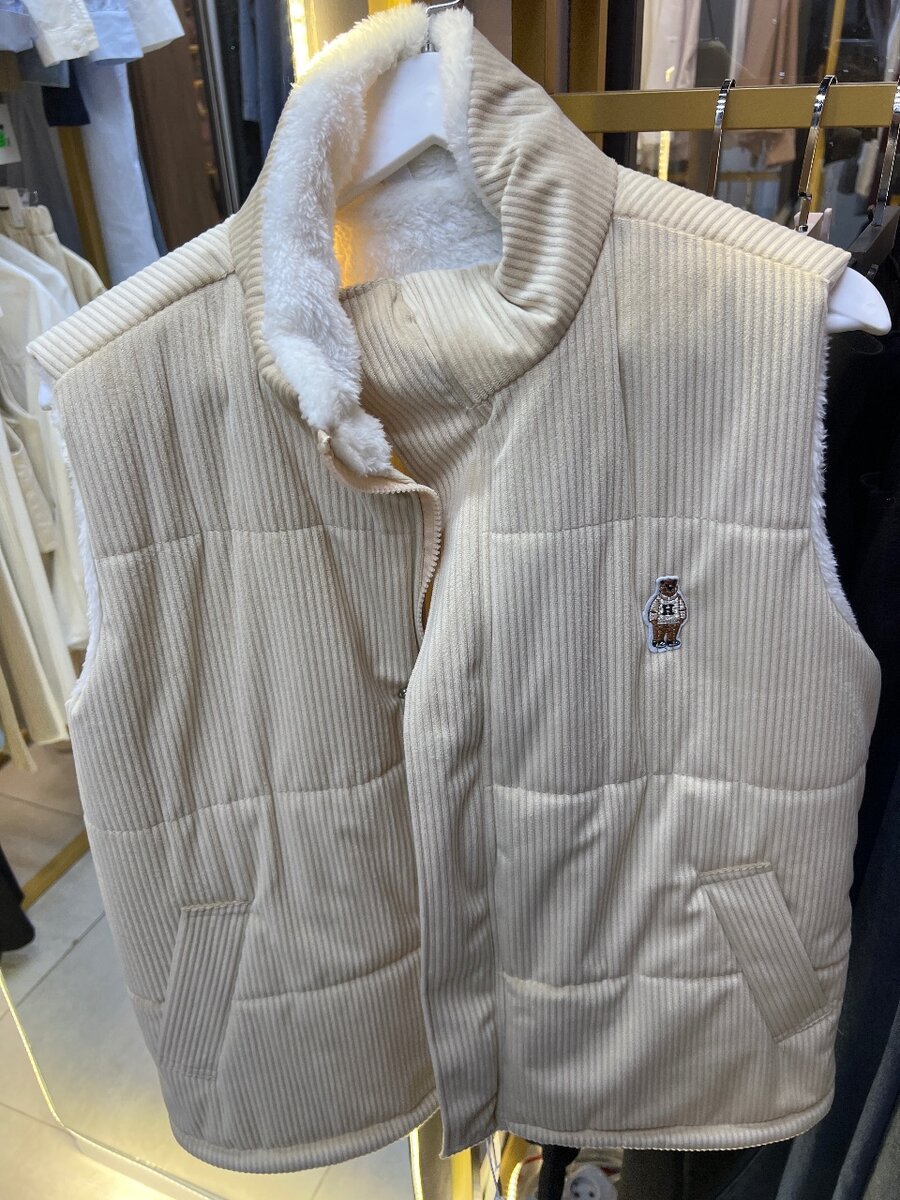 Меховая жилетка