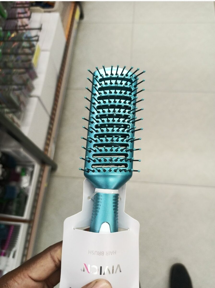 Brosse à cheveux ventilée