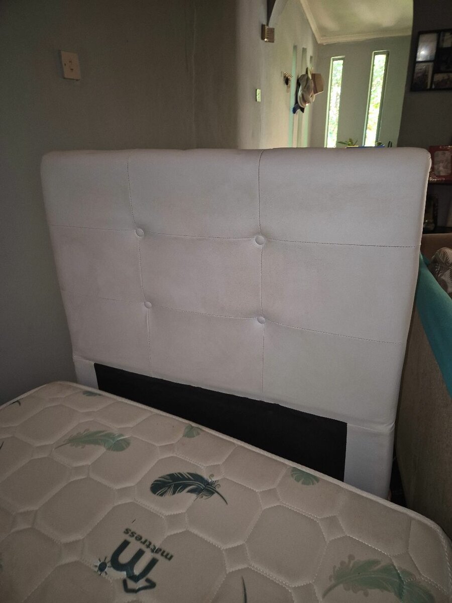 Single bed with headboard