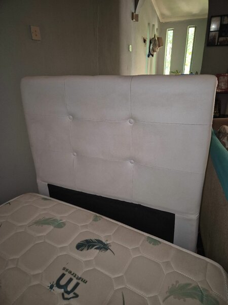 Single bed with headboard