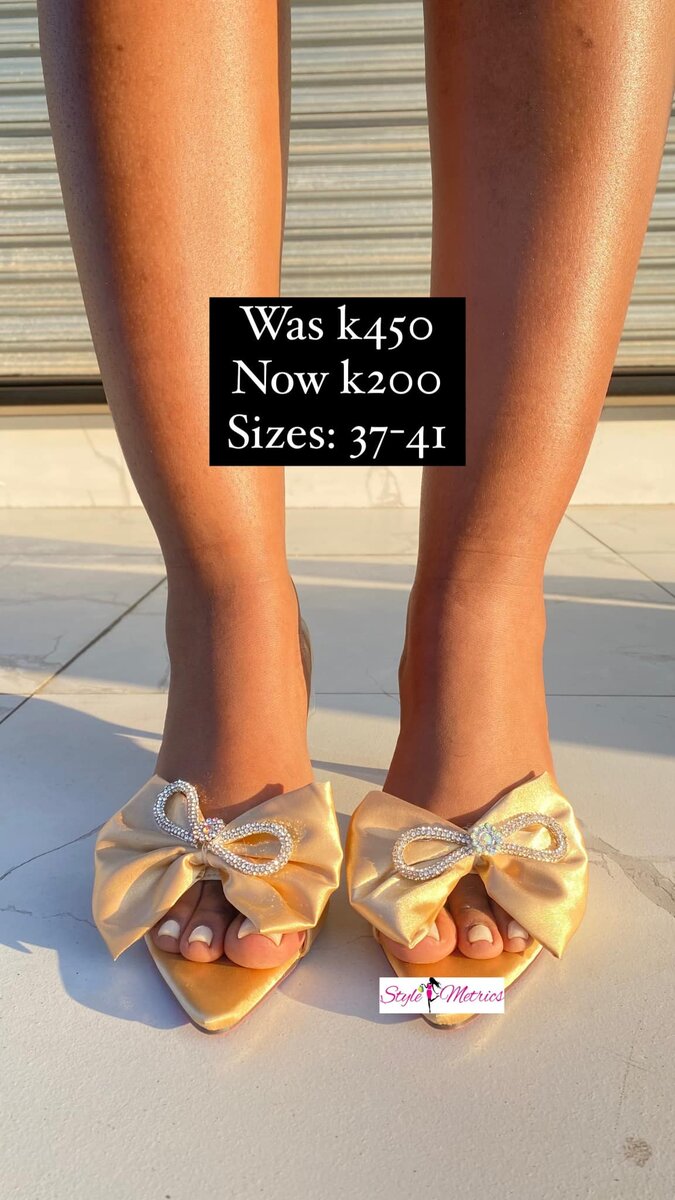 Women's sandals with a bow , with heels