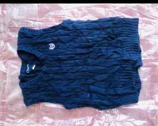 The vest is dark blue