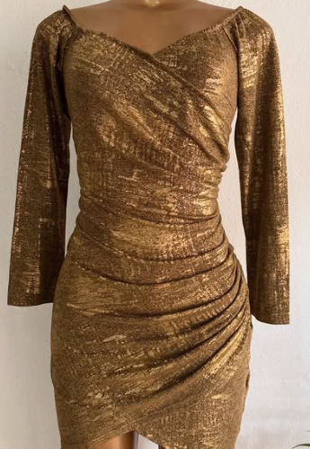 Short party dress in golden shade