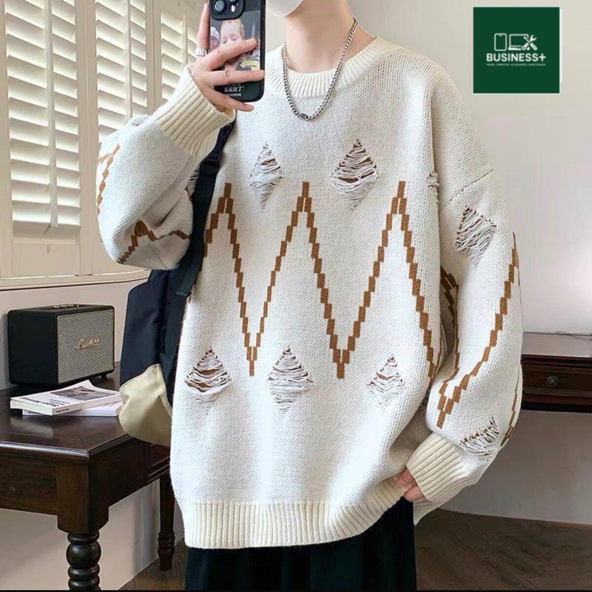 Pull en tricot motif géométrique