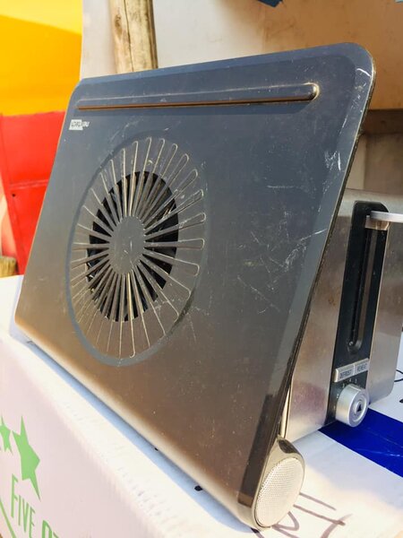 Nextech laptop cooling pad with speakers that connects to an aux cable/fm radio