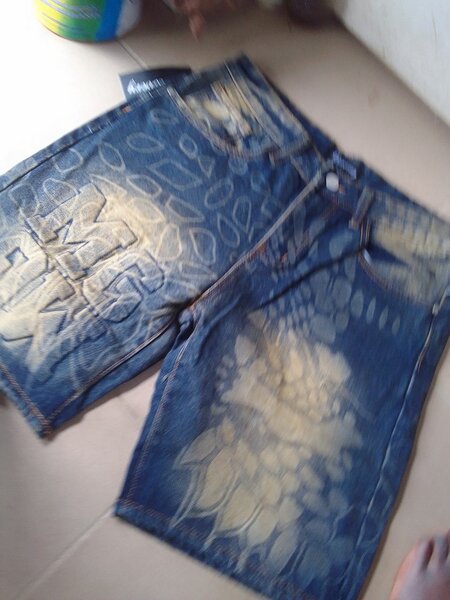 Shorts en jean délavé homme