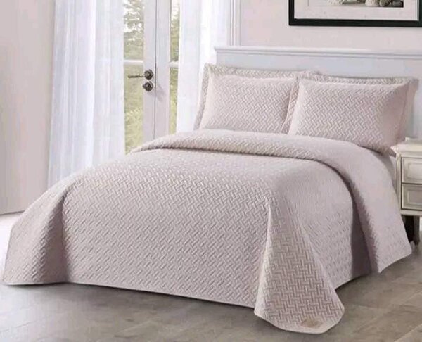 2 continental pillow cases, 2 standards pillow cases and 1 bedspread 