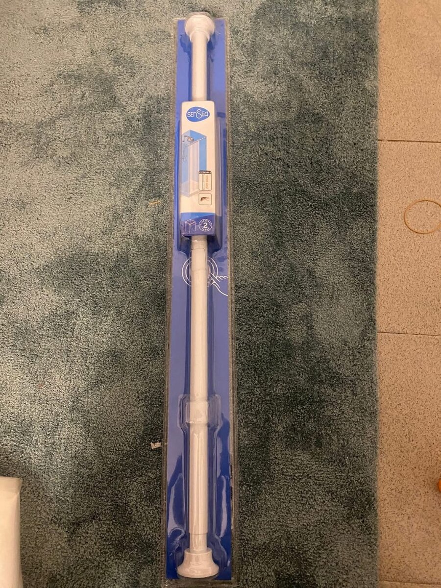 Tringle de douche extensible