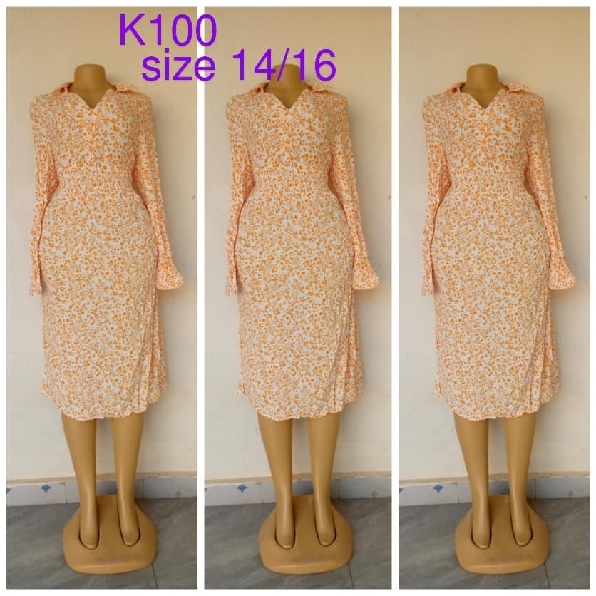 Light orange dress with floral print, size 14/16