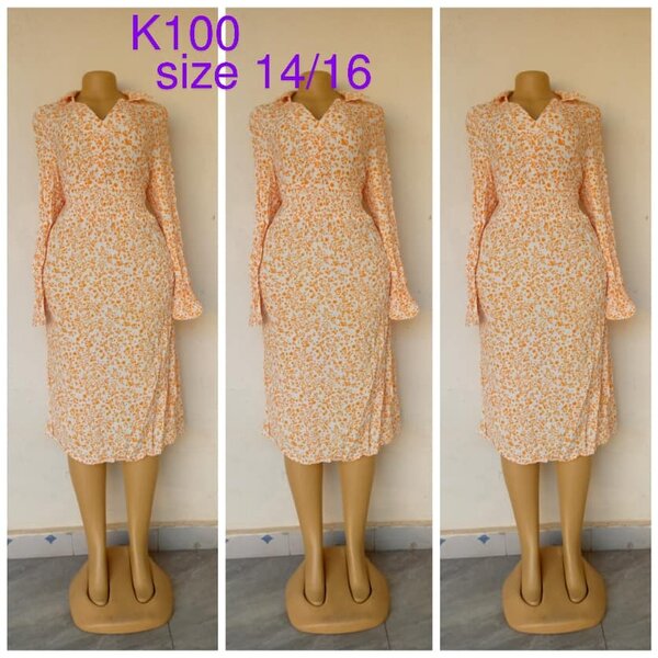 Light orange dress with floral print, size 14/16