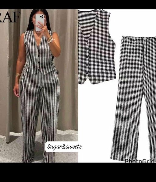 Complt sans manches à carreaux