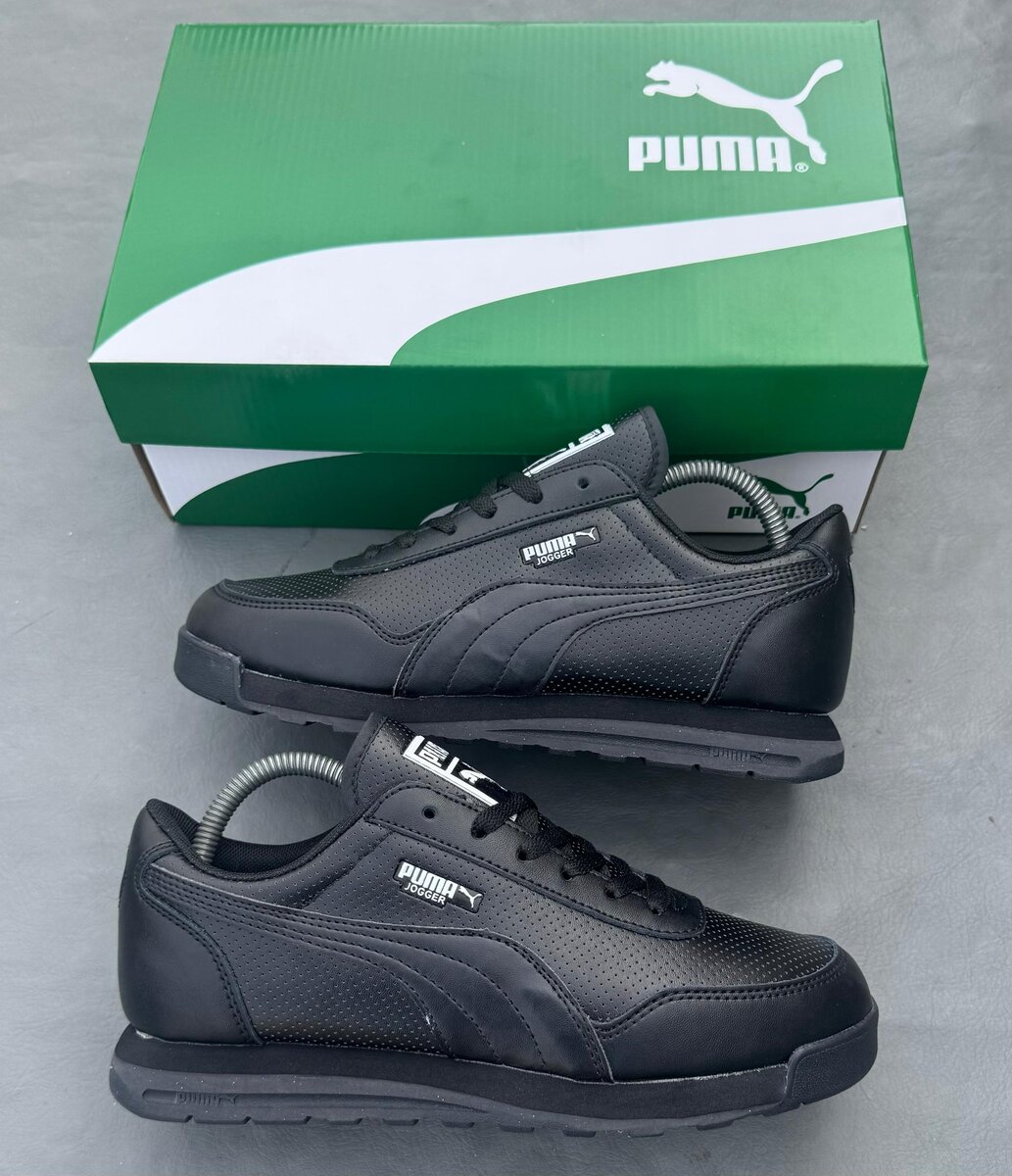 Chaussures Puma noires élégantes