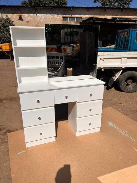 white makeup table with mirror