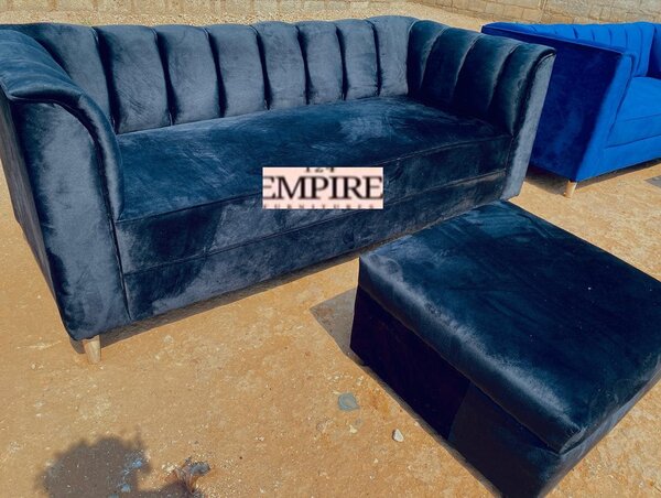 Sofa and ottoman with dark grey upholstery