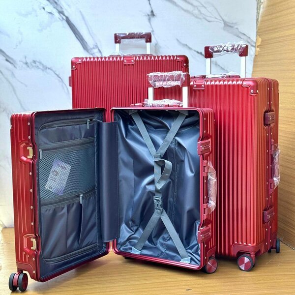 LUXURY STAINLESS SUITCASE  AND TRAVELING BAGS