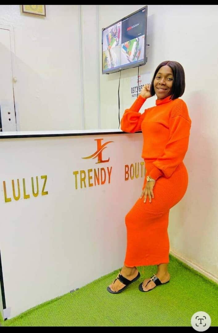 Women's knitted suit, skirt + sweater