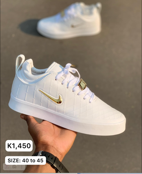 white and gold sneakers