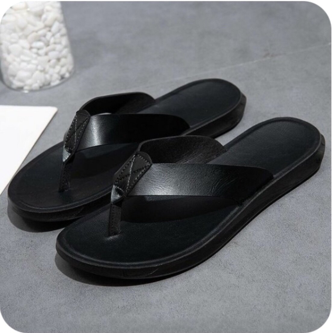 Black leather slippers