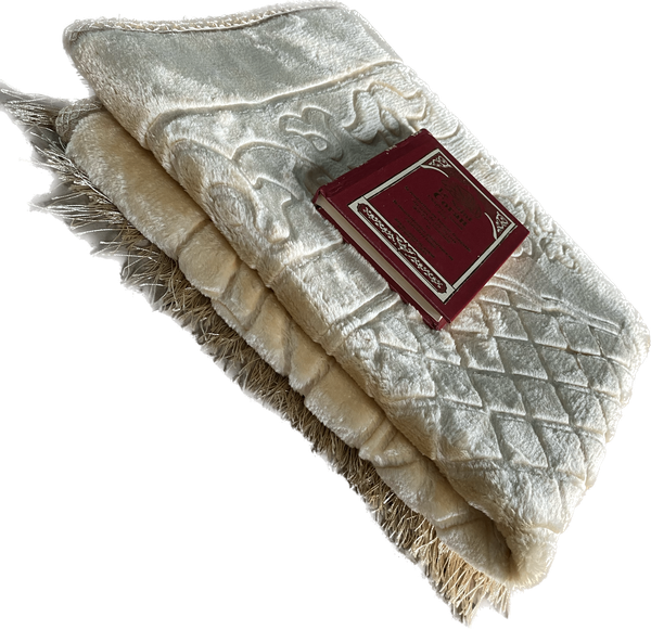 Coran + tapis de prière