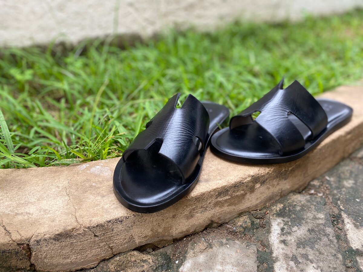 Black leather slides