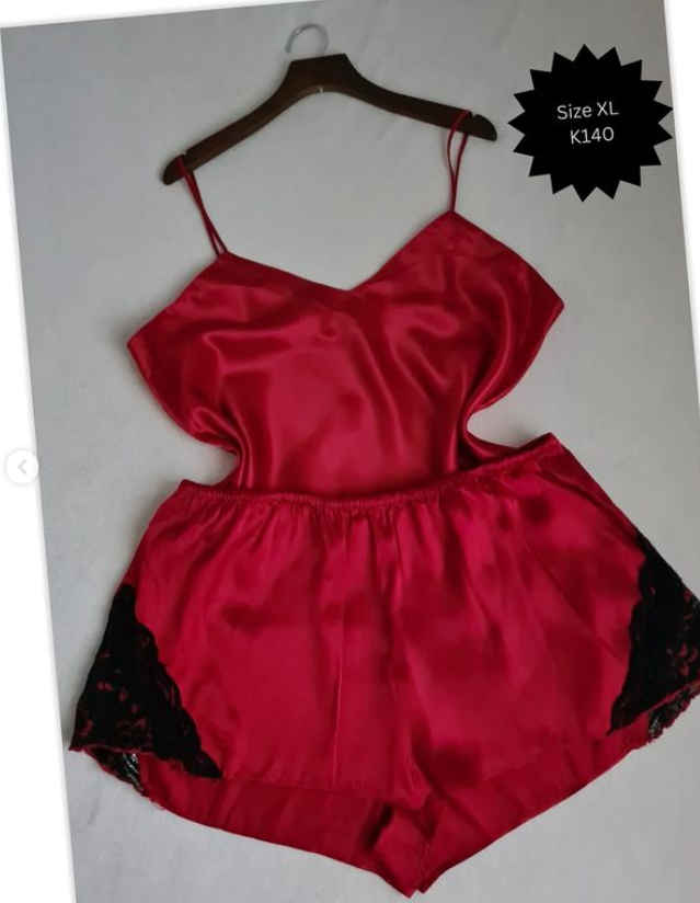 T-shirt and shorts are red